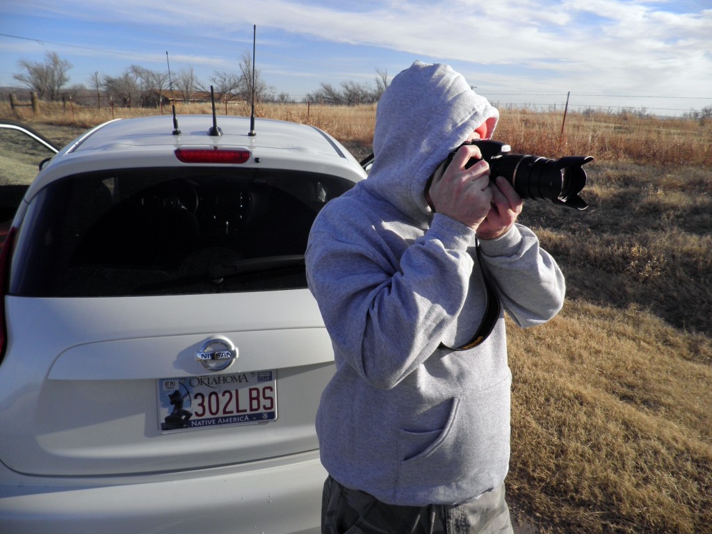 Richard pulled over to try and get some shots of wind turbines; this pose might be posed, for all I know.